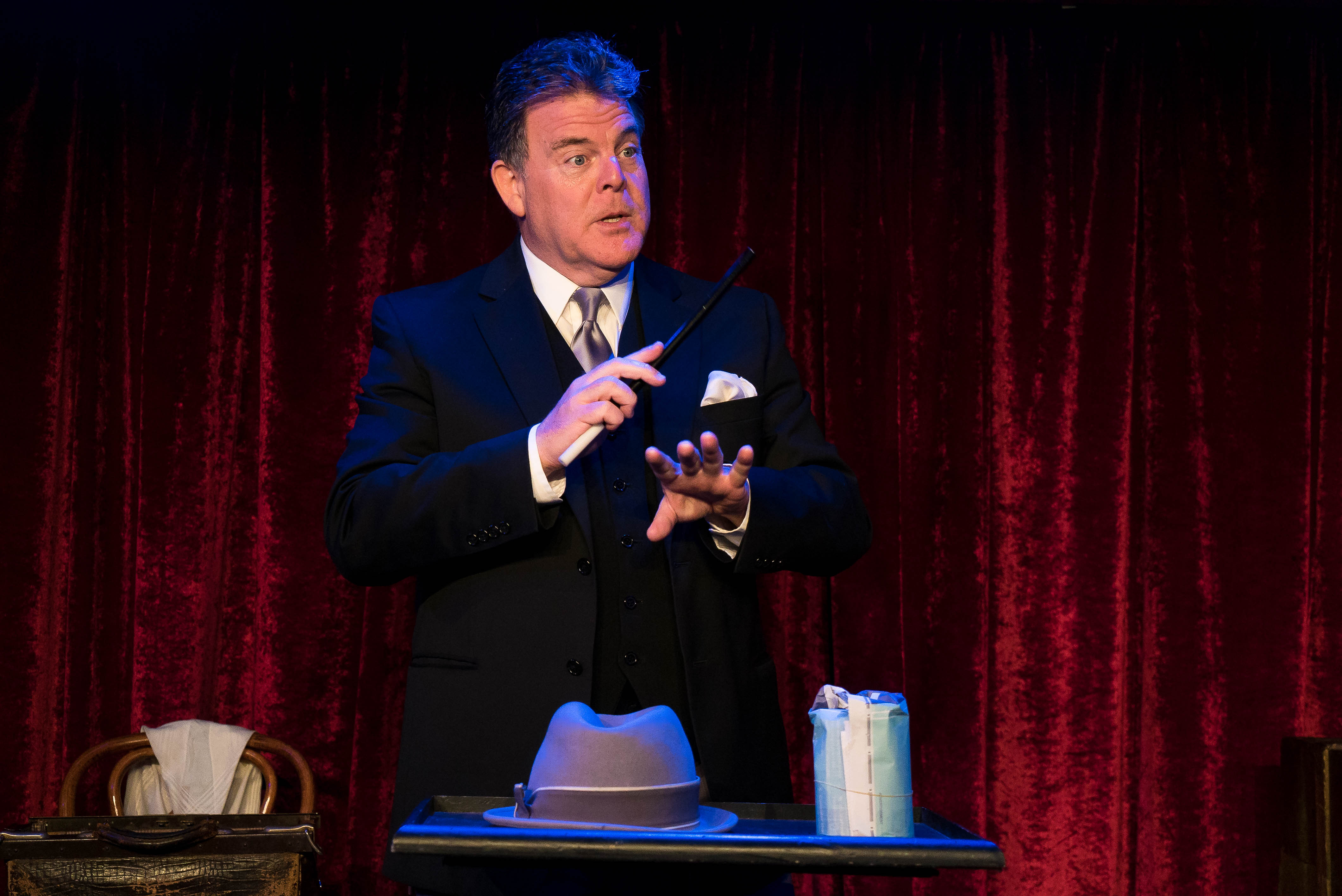 John Carney in character onstage